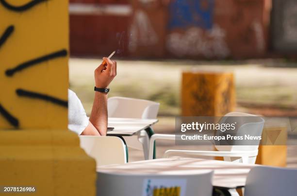 Person smoking on a terrace. On March 12 in Seville . The Councilor for Health and Consumer Affairs, Catalina Garcia, hopes that the measures...