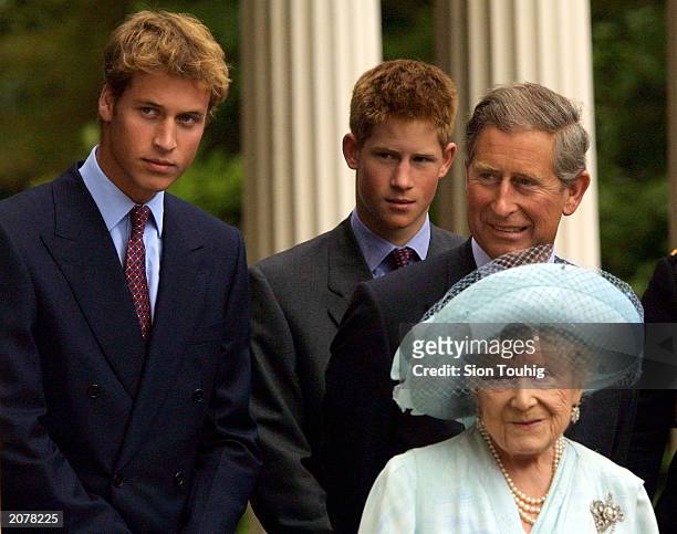 Prince William, Prince Harry and Prince Charles appear with The Queen Mother during celebrations to mark her 101st birthday August 4, 2001 in London....