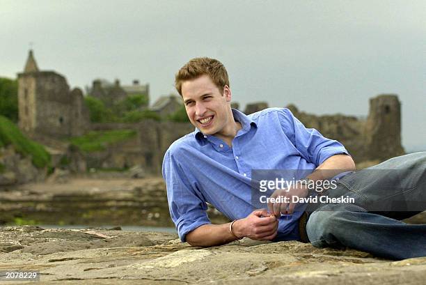 May 28: Prince William poses on the pier May 28, 2003 at St Andrews in Scotland. Prince William will celebrate his 21st birthday on June 21, 2003.