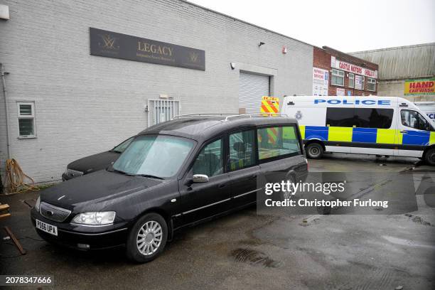 Police continue their investgations at the Hessle Road branch of Legacy Independent Funeral Directors on March 12, 2024 in Hull, England. On Sunday,...