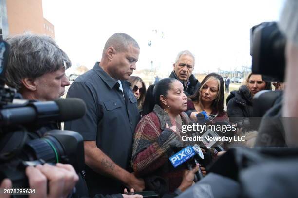 Charles Williams, left, and his sister Coreen Bullock, outside First District Court in Central Islip, New York where they talked to the press on...