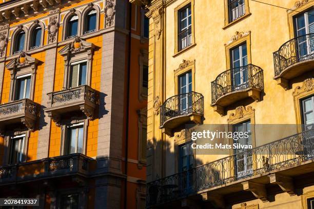 old beautiful buildings with sunlight in city of lugano - mats silvan stock pictures, royalty-free photos & images