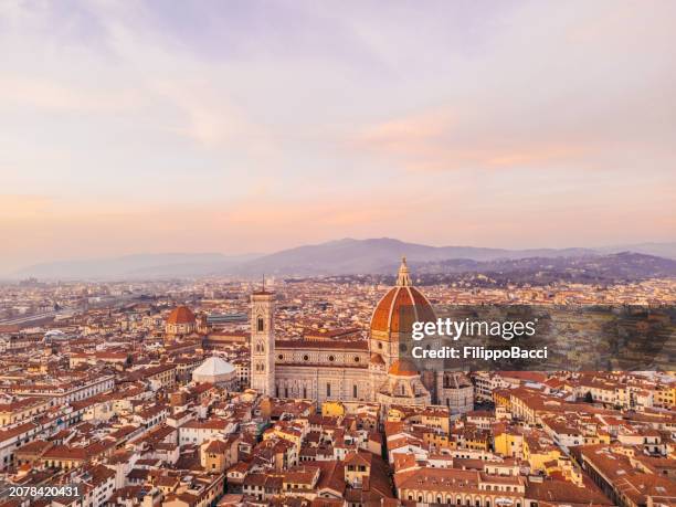 aerial view of florence's skyline at sunset - campanile florence stock pictures, royalty-free photos & images