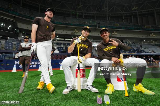 Jackson Merrill, Brett Sullivan and Kyle Higashioka of the San Diego Padres pose for a photo during the 2024 Seoul Series Workout Day at Gocheok Sky...