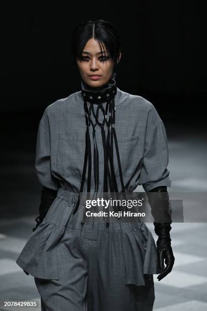 Model walks the runway in a design by HOUGA during the Rakuten Fashion Week TOKYO 2024 A/W on March 12, 2024 in Tokyo, Japan.