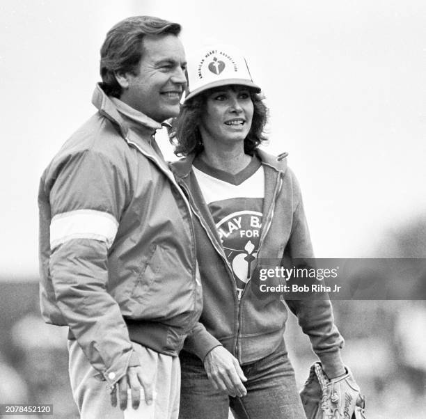 Actress Stefanie Powers and Actor Robert Wagner, who play the titular characters in the television show 'Hart to Hart,' during a celebrity softball...