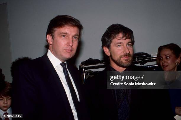 American businessman and ex-president Donald Trump and American filmmaker Steven Spielberg attend the 59th annual National Board of Review of Motion...