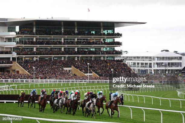 Runners make their way around the course in The Ultima Handicap Steeple Chase during day one of the Cheltenham Festival 2024 at Cheltenham Racecourse...