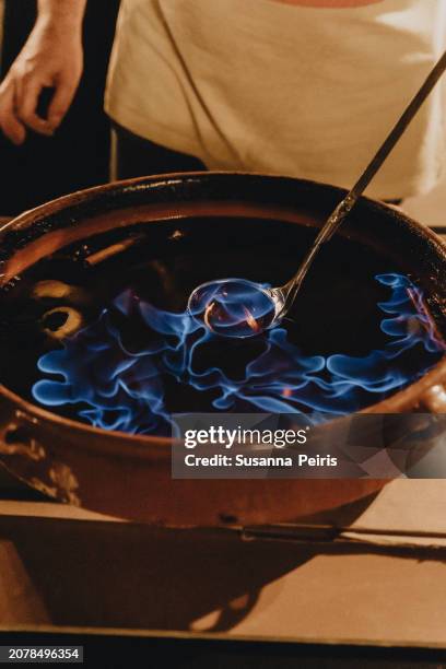 rom cremat (burnt rum) a traditional catalan drink - tarragona province stock pictures, royalty-free photos & images