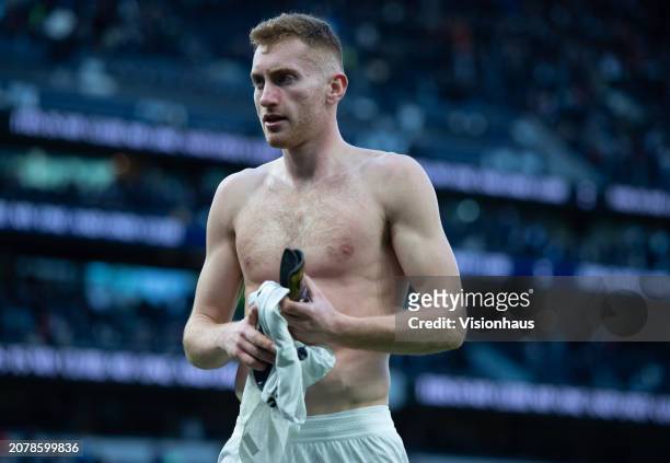 Dejan Kulusevski of Tottenham Hotspur gives his shirt away after the Premier League match between Tottenham Hotspur and Crystal Palace at Tottenham...