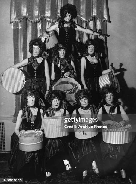 Society debutantes Dorothy Brown, Virginia Wilson, Betty Beardsley, Mrs Chas Caesar, Frances McCoon, Katherine Leslie, Sally Peters) wearing matching...