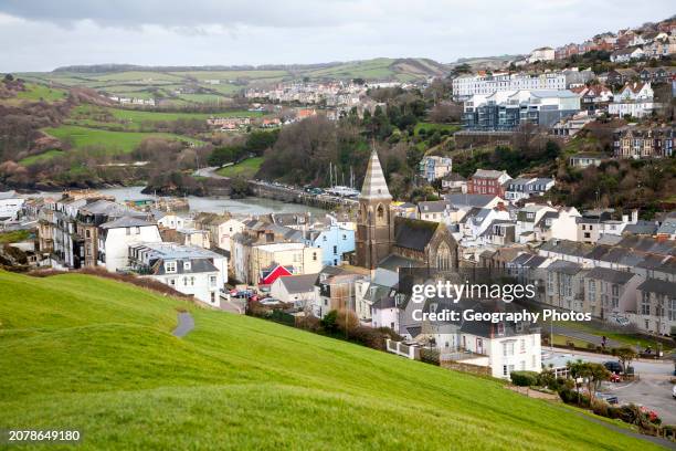 Historic buildings clustered around the harbor, Ilfracombe, north Devon, England.