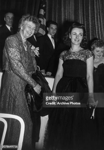 American former US First Lady Eleanor Roosevelt and American author Kathleen Winsor among guests at a literary awards dinner at the Waldorf Astoria...