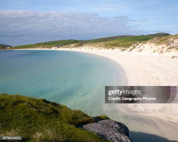 Sandy beach and aquamarine sea at Vatersay Bay, Barra, Outer Hebrides, Scotland, UK.