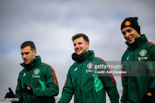 Diogo Dalot, Mason Mount, Antony of Manchester United in action during a first team training session at Carrington Training Ground on March 12, 2024...