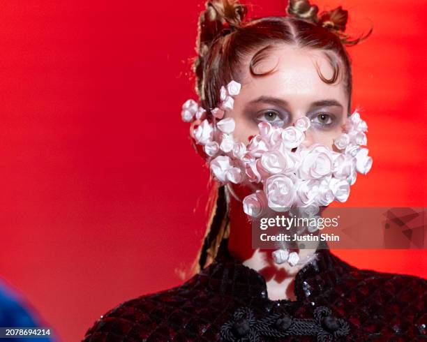 Model, hair and make-up detail, walks the runway in a design by VIVANO during the Rakuten Fashion Week TOKYO 2024 A/W on March 12, 2024 in Tokyo,...