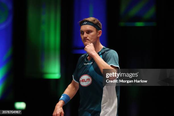 Viktor Axelsen of Denmark reacts against Srikanth Kidambi of India in the Men's Singles Match on Day One of the Yonex All England Open Badminton...