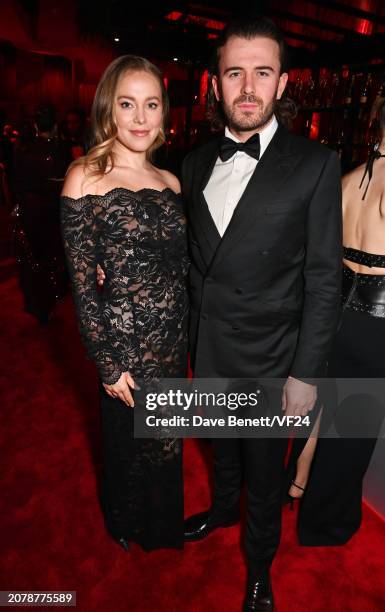 Poppy Jamie and Jack Bryant attend the 2024 Vanity Fair Oscar Party Hosted By Radhika Jones at Wallis Annenberg Center for the Performing Arts on...