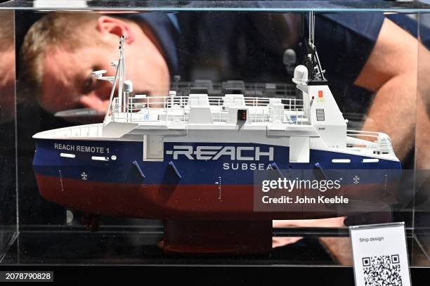 Visitor views a model of the Reach Remote 1 a remote and autonomous vessel able to perform all kinds of traditional survey tasks like seabed mapping,...