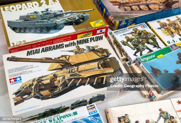 Boxed military model kits on sale at auction, UK Abrams and Leopard tanks.