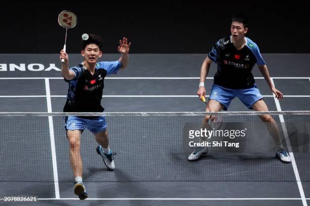 Liu Yuchen and Ou Xuanyi of China compete in the Men's Doubles first Round match against Ong Yew Sin and Teo Ee Yi of Malaysia during day one of the...