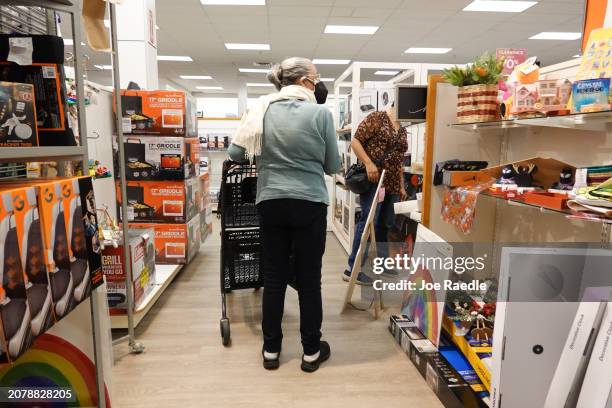 People shop in a Kohl's department store on March 12, 2024 in Miami, Florida. Shares of Kohl's fell as it posted a drop in same-store sales in the...