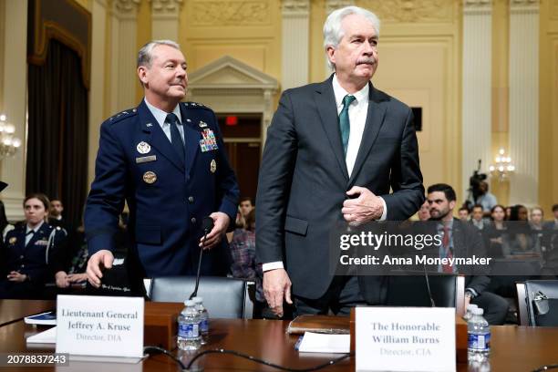 Defense Intelligence Agency Director Lieutenant General Jeffrey Kruse and Central Intelligence Agency Director William Burns arrive to a hearing with...