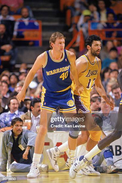 Chris Welp of the Golden State Warriors moves into position against the Los Angeles Lakers during an NBA game in the 1989-90 season. NOTE TO USER:...