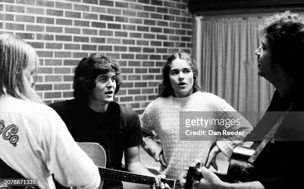Singer songwriter Rodney Crowell rehearses prior to a performance at the Cal State Long Beach State University coffee house in late 1975 along with...