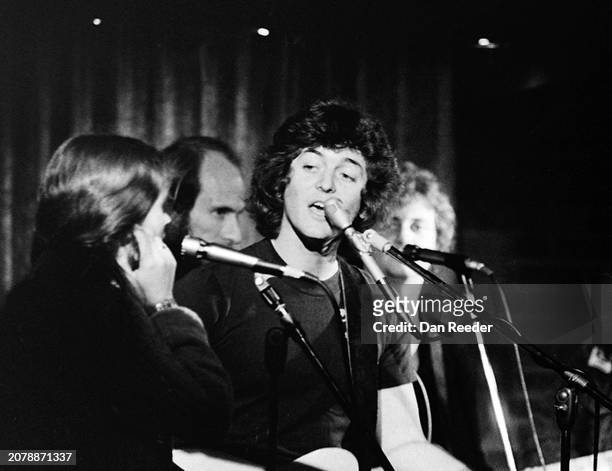 Singer songwriter Rodney Crowell performs on stage at the Cal State Long Beach State University coffee house in late 1975 including singer Nicolette...