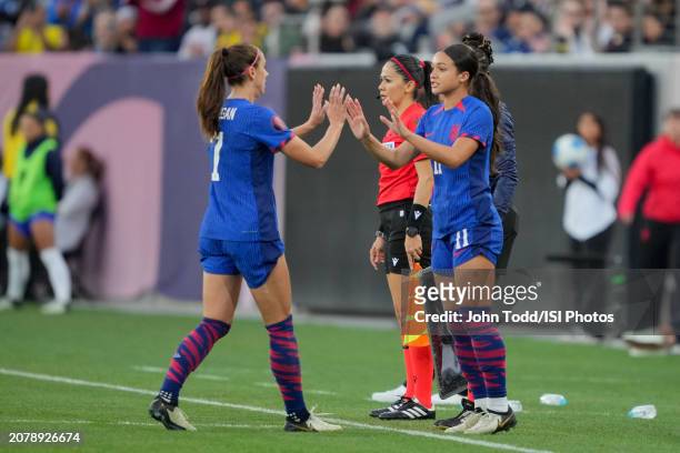 Alex Morgan of the United States exiting the field as Sophia Smith enters during the 2024 Concacaf W Gold Cup Final game between Brazil and USWNT at...
