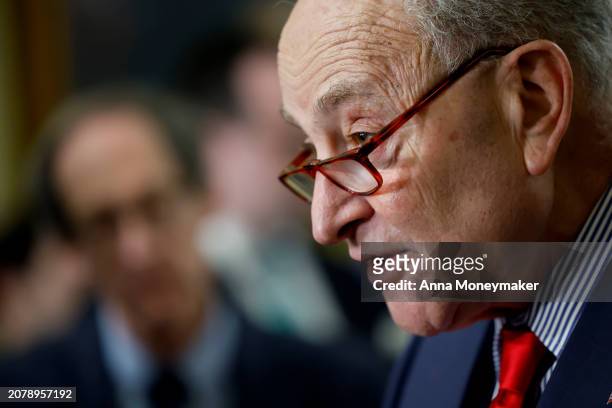 Senate Majority Leader Chuck Schumer speaks to reporters after the weekly Senate Democrats caucus policy luncheon at the U.S. Capitol on March 12,...