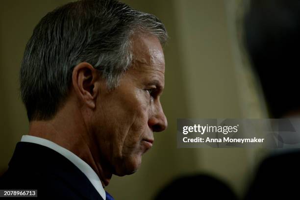 Sen. John Thune listens during a press conference after the weekly Senate Republicans caucus policy luncheon at the U.S. Capitol on March 12, 2024 in...