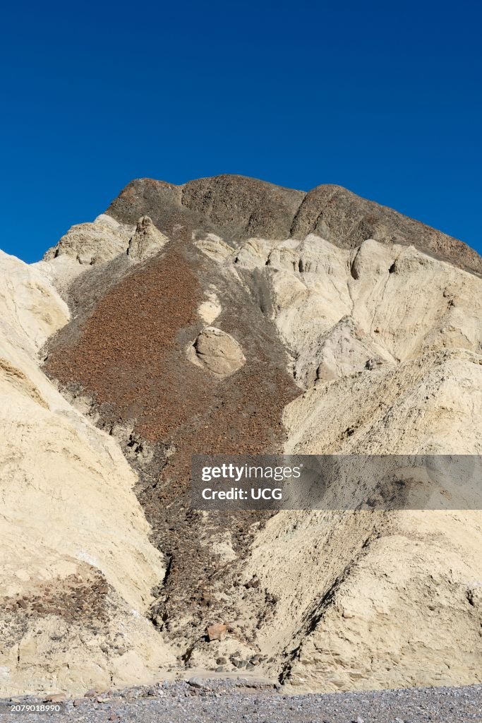 Basaltic talus eroded from ridge-capping lava flow, Death Valley ...