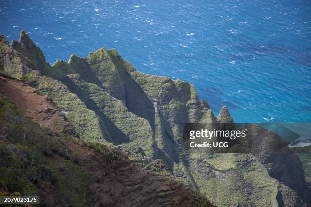 Cliffs of basalt flows on the Na Pali Coast from Waimea Canyon State Park, Kauai, Hawaii.