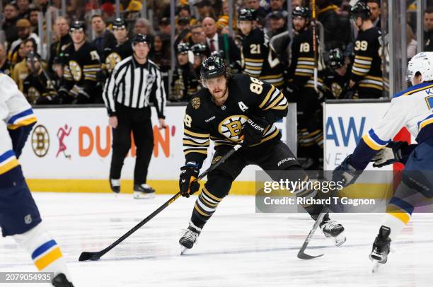 David Pastrnak of the Boston Bruins skates against the St. Louis Blues at the TD Garden on March 11, 2024 in Boston, Massachusetts. The Blues won 5-1.