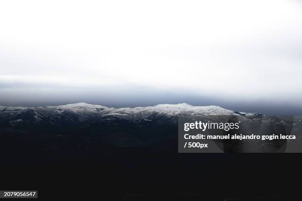 scenic view of snowcapped mountains against sky - lecca lecca stock pictures, royalty-free photos & images