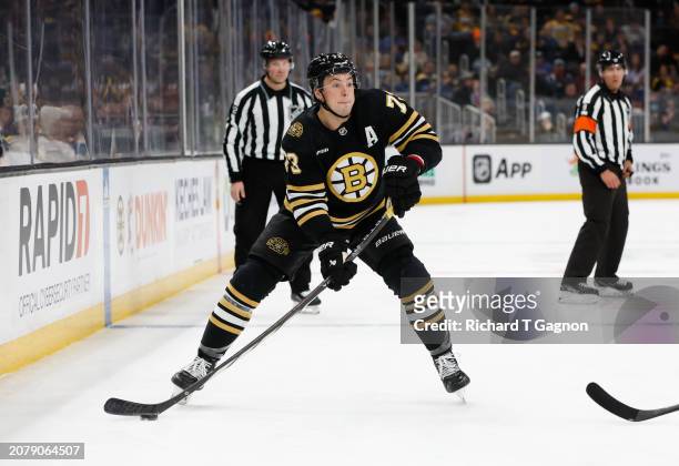 Charlie McAvoy of the Boston Bruins skates against the St. Louis Blues during the third period at the TD Garden on March 11, 2024 in Boston,...