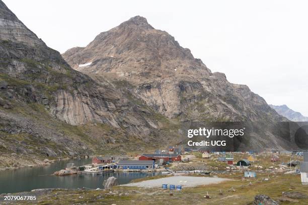 Aappilattoq, a village perched on Archean rock in Prince Christian Sound, Greenland.