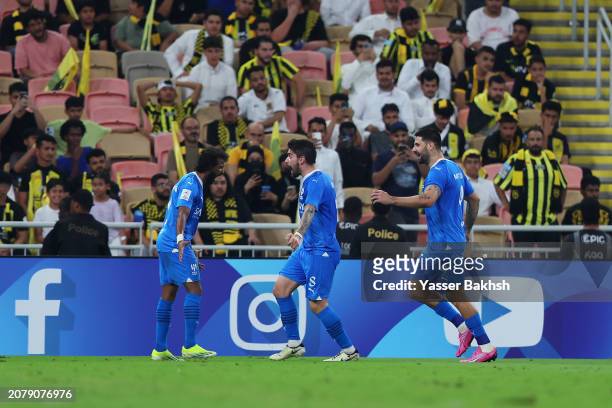Yasser Al-Shahrani of Al Hilal celebrates with teammates after scoring his team's first goal during the AFC Champions League Quarter Final 2nd Leg...