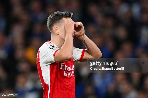 Leandro Trossard of Arsenal celebrates scoring his team's first goal during the UEFA Champions League 2023/24 round of 16 second leg match between...
