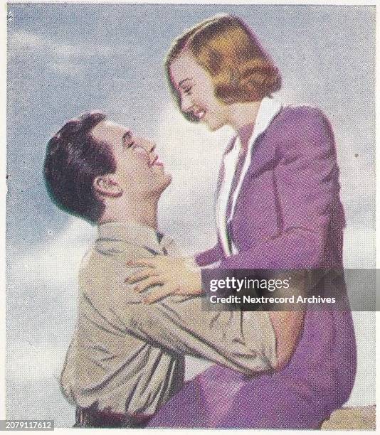 Collectible tobacco or cigarette card, 'Famous Love Scenes' series, published in 1939 by Godfrey Phillips Ltd, portraying famous onscreen movie...