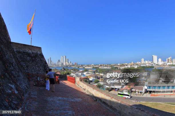 Cartagena, Colombia, Tourist observe the walled city from the Castle of San Felipe in Cartagena.