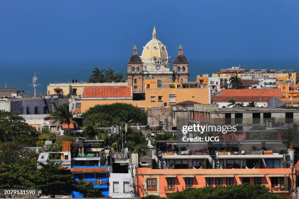 Cartagena, Colombia, Panoramic view of the domes of the San Pedro Claver Churches and their bell towers facing the Caribbean sea..