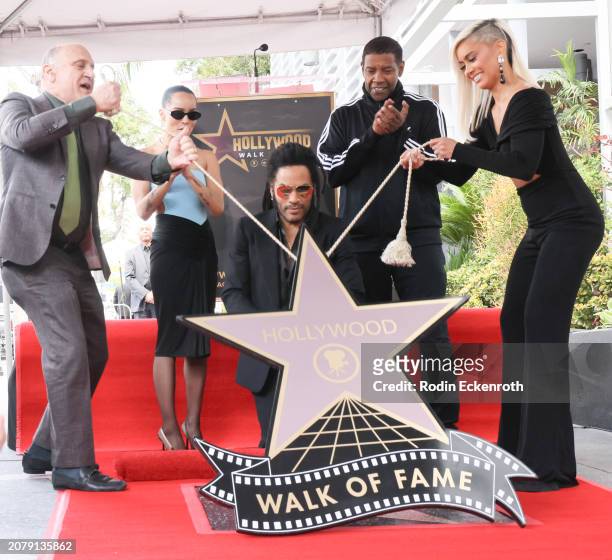 Steve Nissen, Zoë Kravitz, Lenny Kravitz, Denzel Washington and Sibley Scoles at Lenny Kravitz Hollywood Walk of Fame Star ceremony on March 12, 2024...