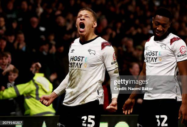 Dwight Gayle of Derby County celebrates after scoring his team's first goal during the Sky Bet League One match between Derby County and Reading at...