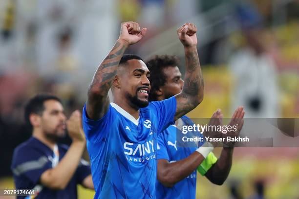 Malcom of Al Hilal celebrates at full-time following the team's victory in the AFC Champions League Quarter Final 2nd Leg match between Al Ittihad...