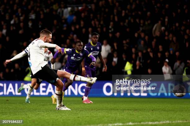 Conor Hourihane scores his team's second goal from the penalty spot during the Sky Bet League One match between Derby County and Reading at Pride...