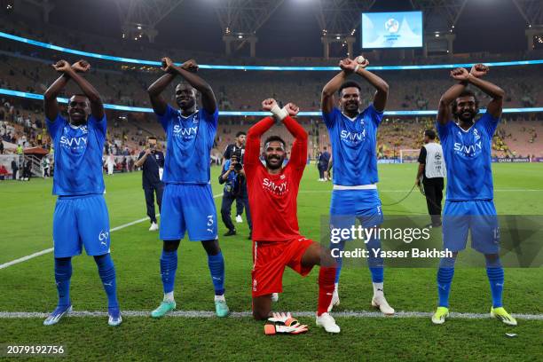 Saud Abdulhamid, Kalidou Koulibaly, Mohammed Al-Owais, Ali Al-Bulayhi and Yasser Al-Shahrani of Al Hilal show appreciation to the fans at full-time...