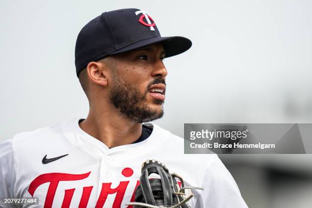 Carlos Correa of the Minnesota Twins looks on during a spring training game against the Boston Red Sox on March 6, 2024 at the Lee County Sports...